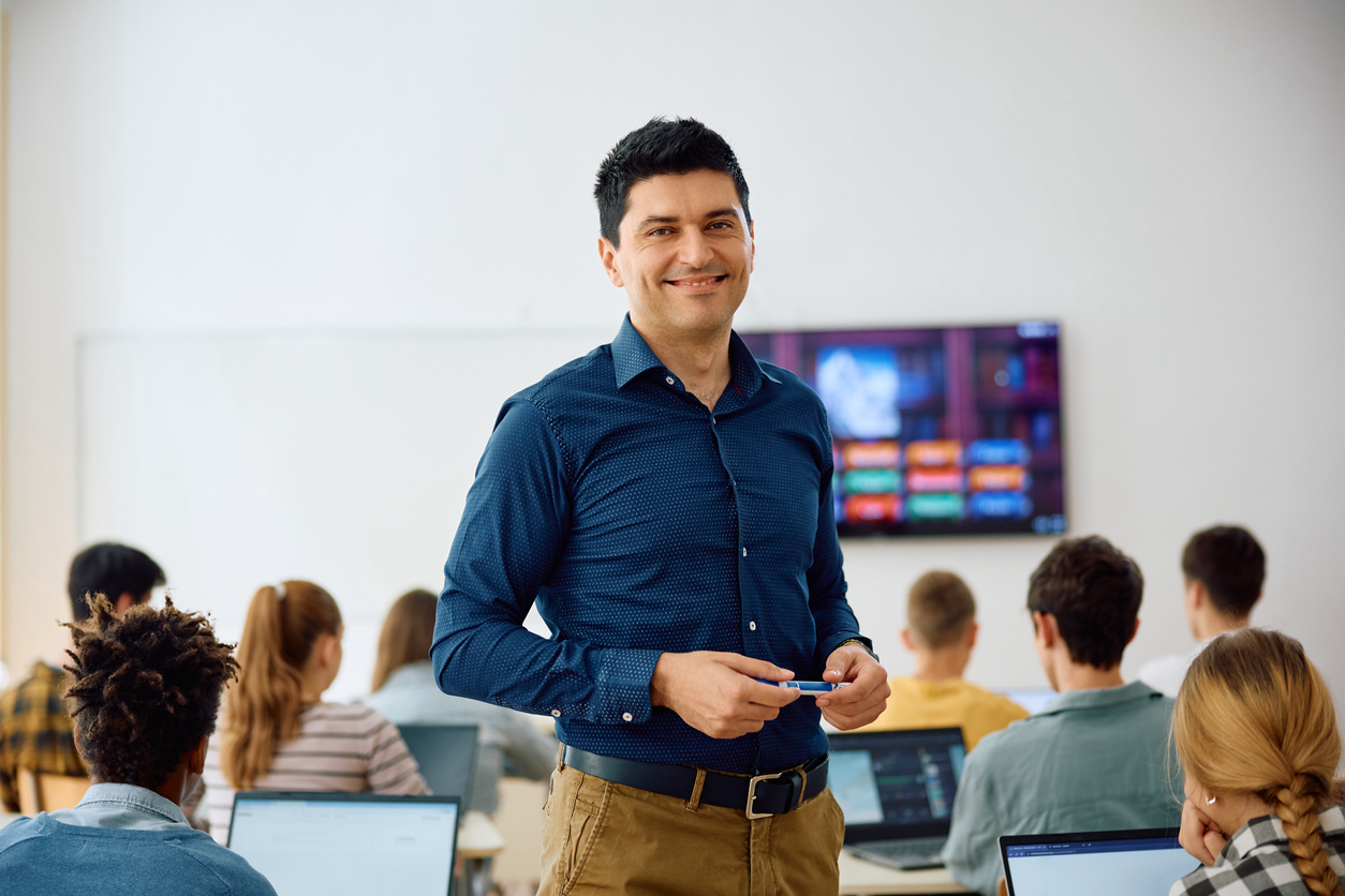 Teacher in computer classroom